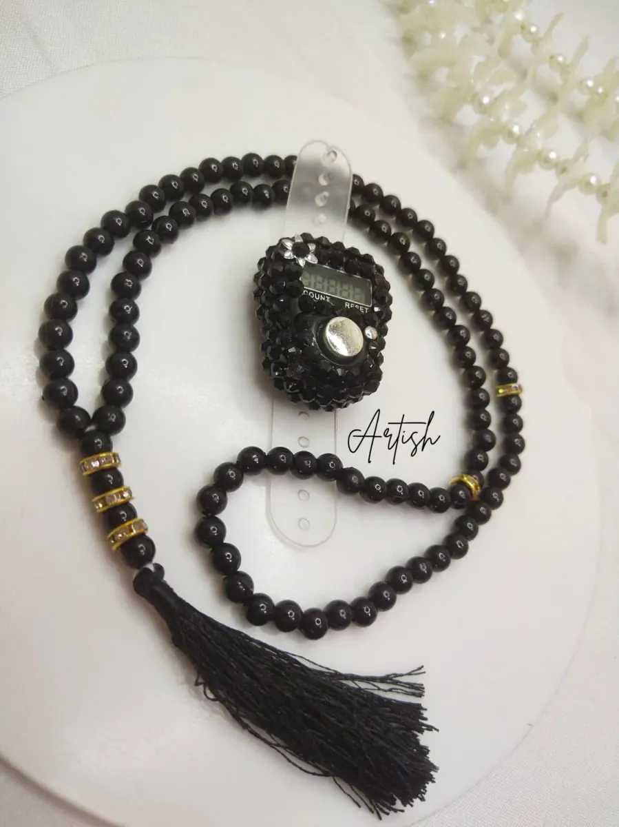 Black decorative counter with prayer beads